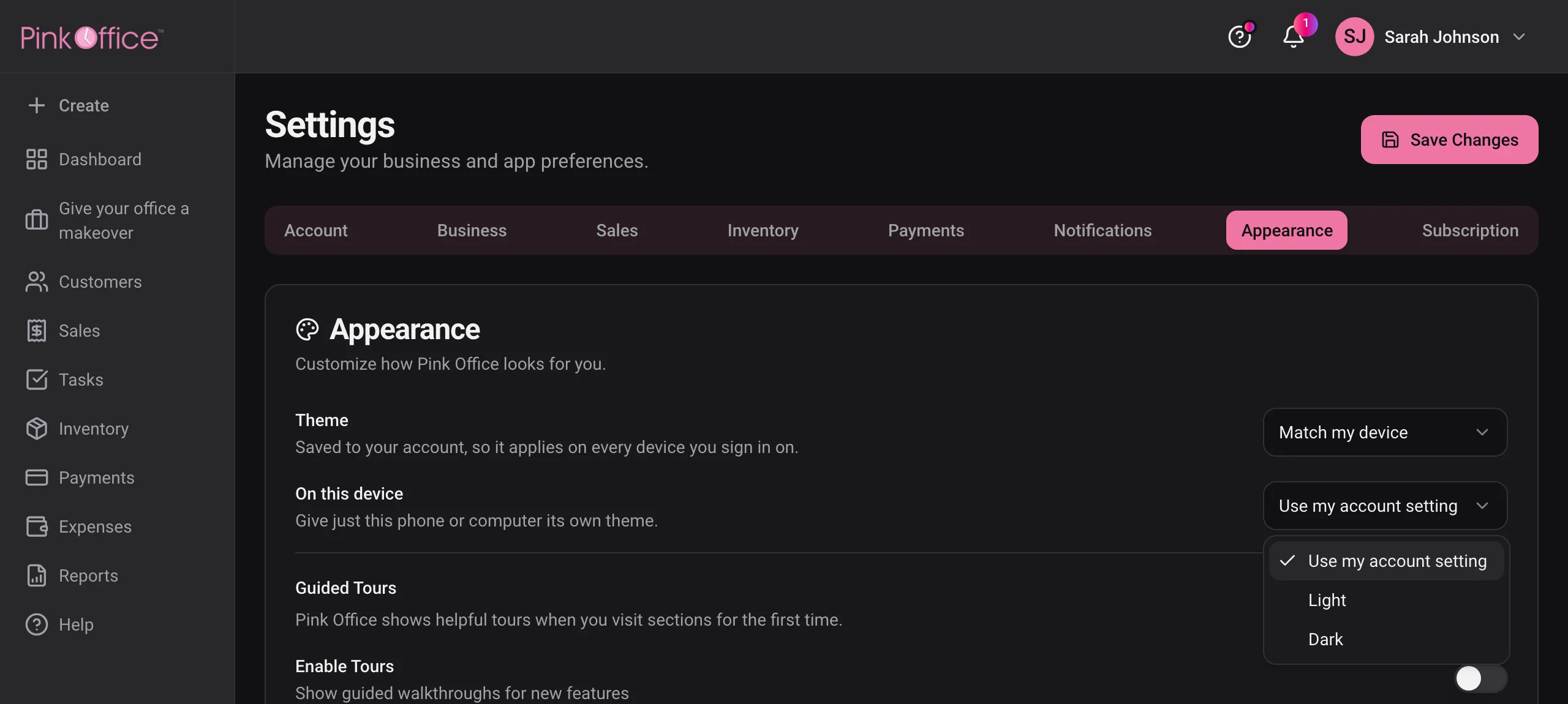 Pink Office Settings in dark mode, with the pink Appearance tab selected and the Theme and On this device menus showing Use my account setting, Light and Dark.